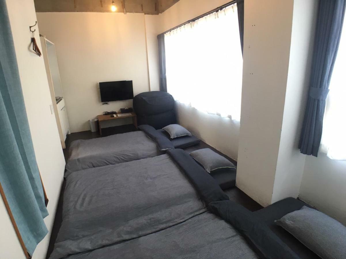 Guest House Golden Mile Hostel Amami Exterior foto